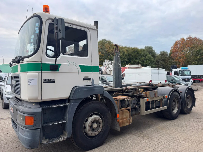 MAN 33.403 **BELGIAN TRUCK-FULL STEEL-MANUAL PUMP** - Multibasculante camión: foto 1 MAN 33.403 **BELGIAN TRUCK-FULL STEEL-MANUAL PUMP** - Multibasculante camión: foto 1