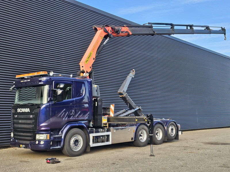 Scania G490 8x4*4 / PALFINGER CRANE + HOOKLIFT - Multibasculante camión, Camión grúa: foto 1 Scania G490 8x4*4 / PALFINGER CRANE + HOOKLIFT - Multibasculante camión, Camión grúa: foto 1