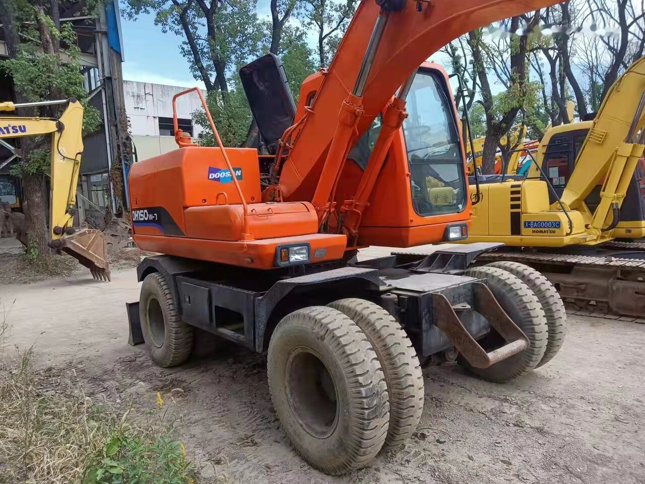 Doosan DH150W - Excavadora de ruedas: foto 1 Doosan DH150W - Excavadora de ruedas: foto 1