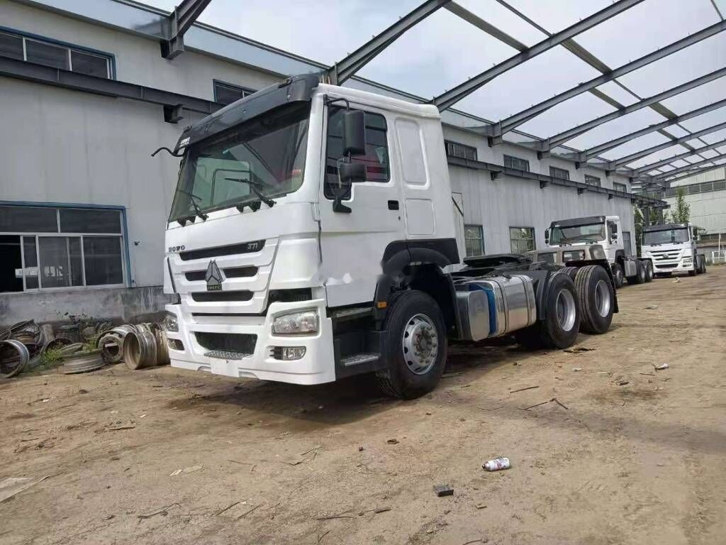 Sinotruk HOWO 6*4 Tractor - Portacontenedore/ Intercambiable camión: foto 1 Sinotruk HOWO 6*4 Tractor - Portacontenedore/ Intercambiable camión: foto 1