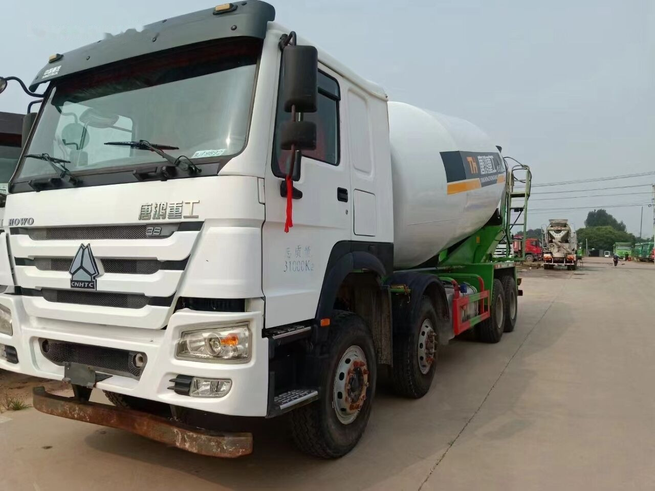 Sinotruk HOWO 8*4 Concrete mixer truck - Camión hormigonera: foto 1 Sinotruk HOWO 8*4 Concrete mixer truck - Camión hormigonera: foto 1