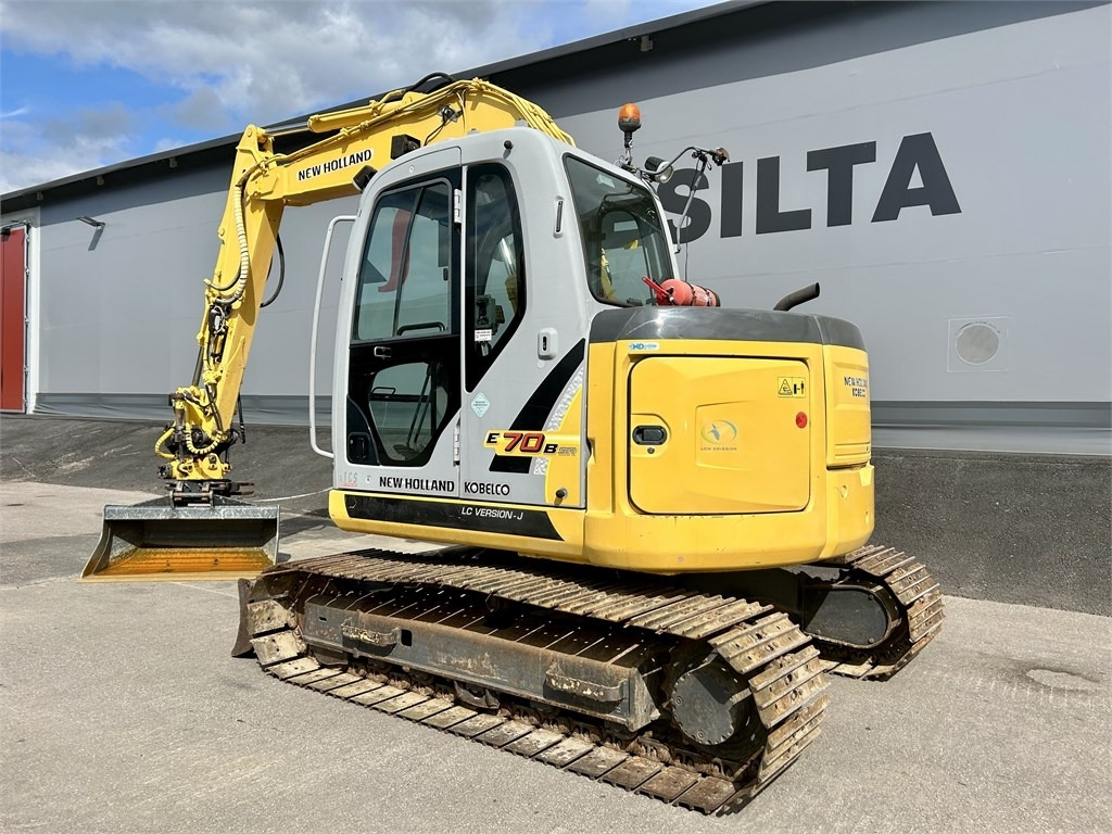 New Holland E 70BSR 2D MITTALAITTEET - Miniexcavadora: foto 2 New Holland E 70BSR 2D MITTALAITTEET - Miniexcavadora: foto 2