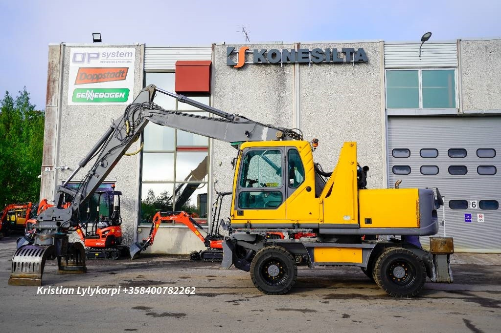 Volvo EW160B NOUSUHYTTI MATERIAALIKONE - Manipulador de materiales: foto 1 Volvo EW160B NOUSUHYTTI MATERIAALIKONE - Manipulador de materiales: foto 1