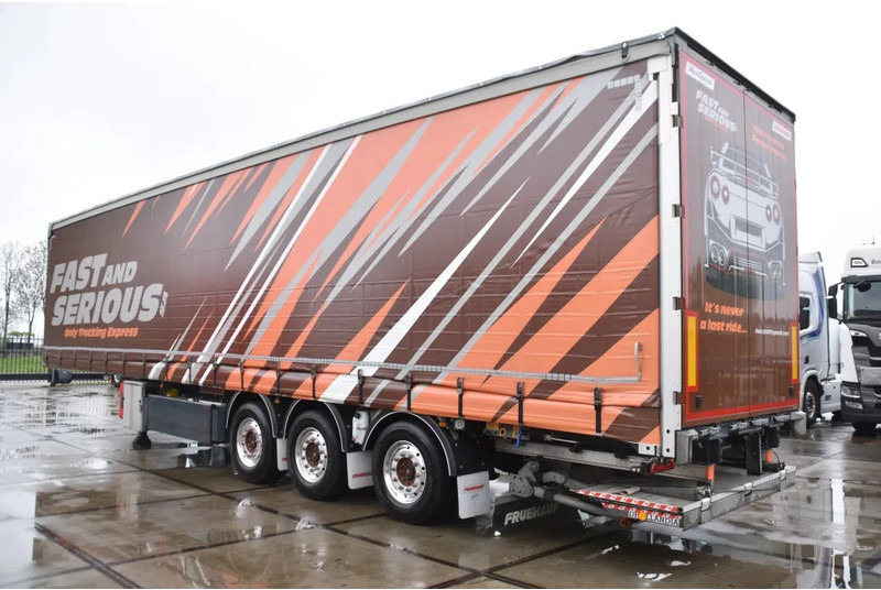 Fruehauf SLIDING CURTAINS/ROOF - TOPLIFT SYSTEM - LIFT AXLE - STEERING AXLE - SAF AXLES - ALCOA'S - DHOLLANDIA - TOP CONDITION - - Semirremolque lona: foto 4 Fruehauf SLIDING CURTAINS/ROOF - TOPLIFT SYSTEM - LIFT AXLE - STEERING AXLE - SAF AXLES - ALCOA'S - DHOLLANDIA - TOP CONDITION - - Semirremolque lona: foto 4