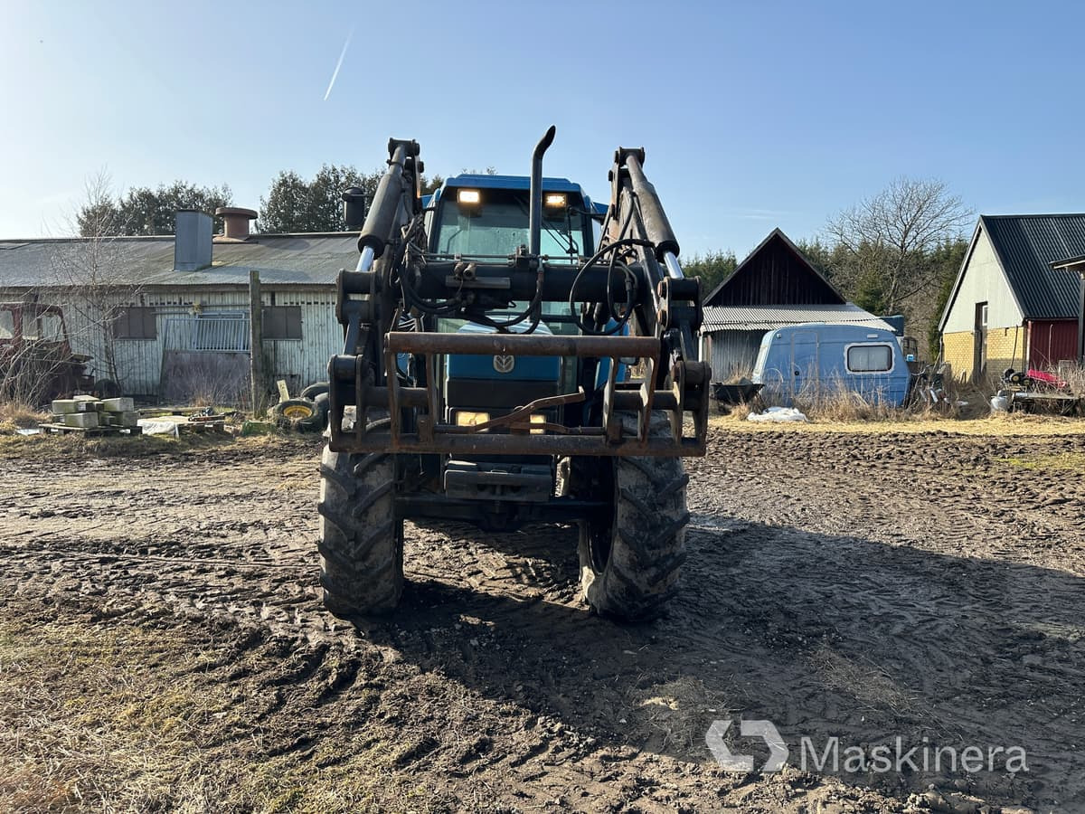 Traktor New Holland 7740 + Frontlastare - Tractor: foto 2 Traktor New Holland 7740 + Frontlastare - Tractor: foto 2