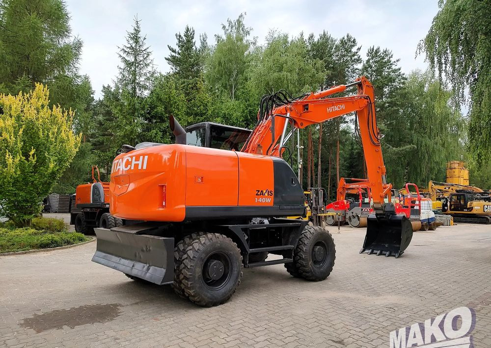 Hitachi ZX 140 - Excavadora de ruedas: foto 4 Hitachi ZX 140 - Excavadora de ruedas: foto 4