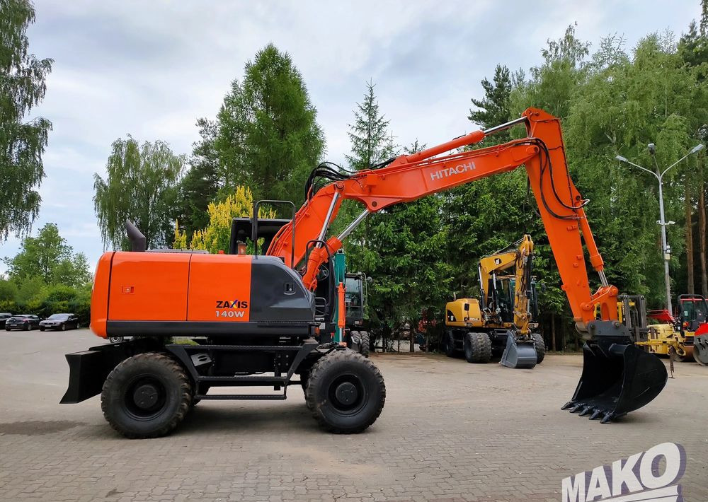 Hitachi ZX 140 - Excavadora de ruedas: foto 5 Hitachi ZX 140 - Excavadora de ruedas: foto 5