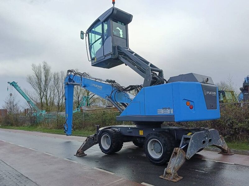 Fuchs MHL 331 overslagkraan waste handler umslag bagger - Manipulador de materiales: foto 2 Fuchs MHL 331 overslagkraan waste handler umslag bagger - Manipulador de materiales: foto 2
