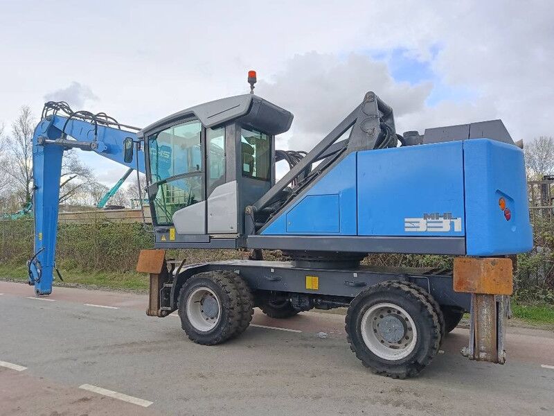 Fuchs MHL 331 overslagkraan waste handler umslag bagger - Manipulador de materiales: foto 3 Fuchs MHL 331 overslagkraan waste handler umslag bagger - Manipulador de materiales: foto 3