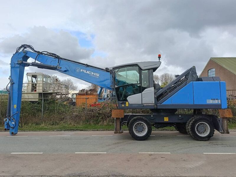 Fuchs MHL 331 overslagkraan waste handler umslag bagger - Manipulador de materiales: foto 4 Fuchs MHL 331 overslagkraan waste handler umslag bagger - Manipulador de materiales: foto 4