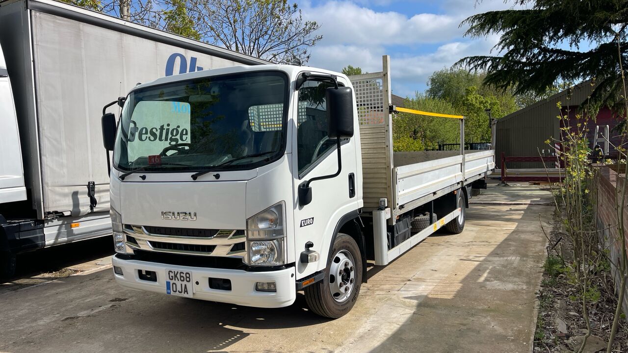 ISUZU N75 150 - Camión caja abierta: foto 2 ISUZU N75 150 - Camión caja abierta: foto 2