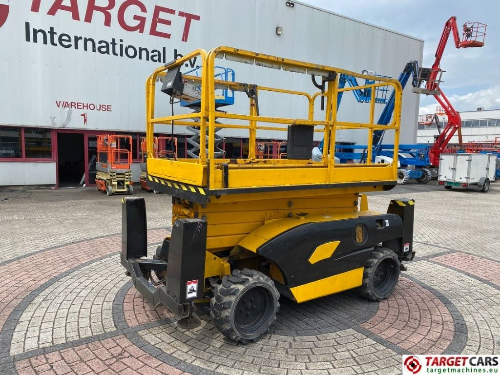 Haulotte Compact 12DX Diesel 4x4 Scissor Work Lift 1206cm - Plataforma de tijeras: foto 1 Haulotte Compact 12DX Diesel 4x4 Scissor Work Lift 1206cm - Plataforma de tijeras: foto 1