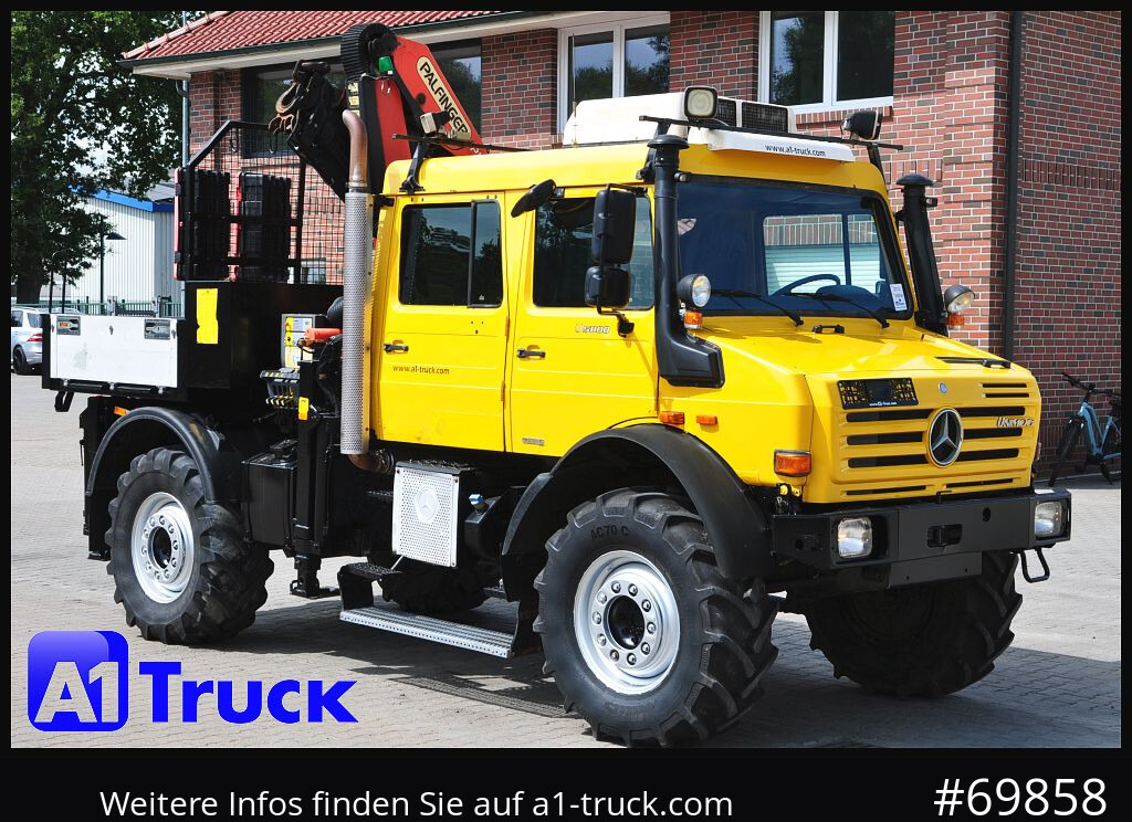 Camión grúa UNIMOG Unimog U 5000 437/45 Kran Doka 6 Sitze: foto 1