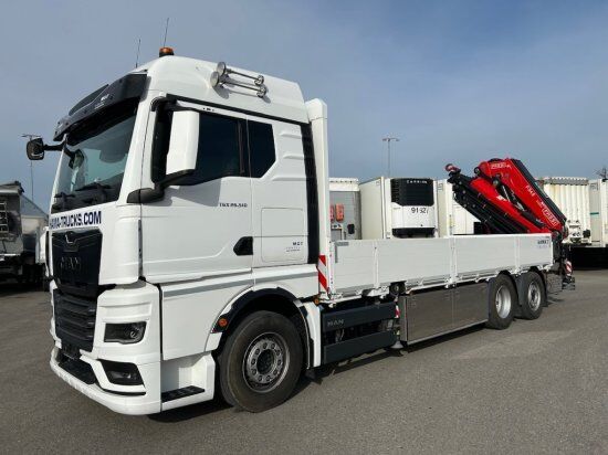 MAN TGX Pritsche, Kran Fassi F545RA.2.28XE, Containerverschlüsse, Inbetriebnahme erst 2025!!! - Camión caja abierta: foto 1 MAN TGX Pritsche, Kran Fassi F545RA.2.28XE, Containerverschlüsse, Inbetriebnahme erst 2025!!! - Camión caja abierta: foto 1