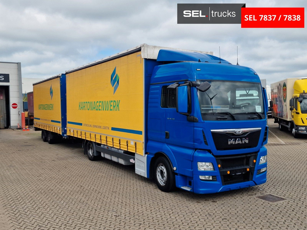 MAN TGX 18.440 4X2 LL-U/ Intarder /Hubdach/Durchlade - Camión lona: foto 3 MAN TGX 18.440 4X2 LL-U/ Intarder /Hubdach/Durchlade - Camión lona: foto 3