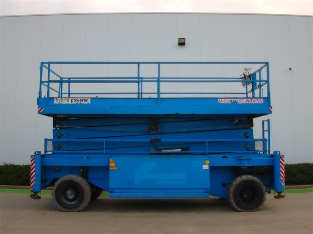 Holland Lift M250DL27 - Plataforma de tijeras: foto 1 Holland Lift M250DL27 - Plataforma de tijeras: foto 1