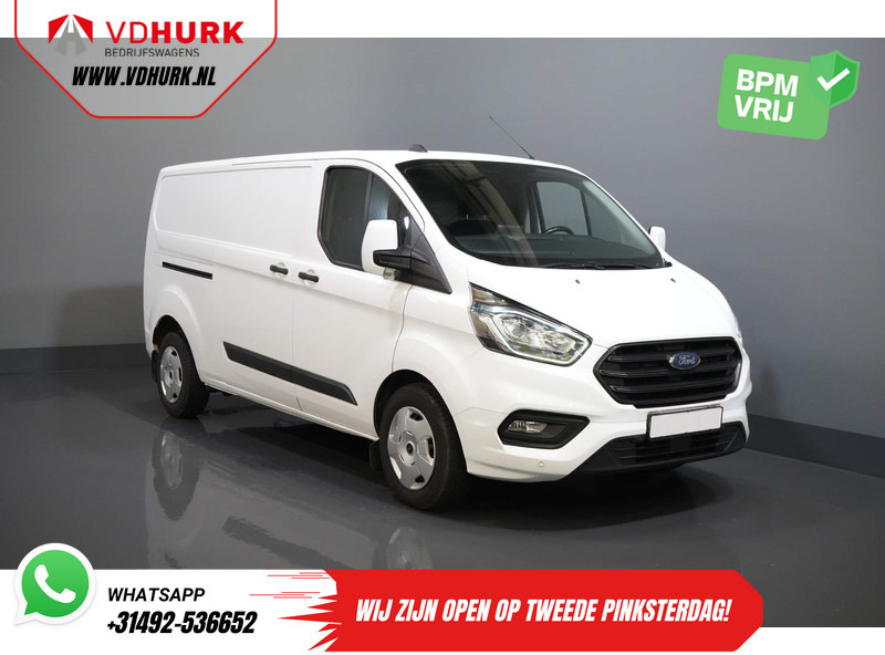 Ford Transit Custom 340 2.0 TDCI 130 pk L2 Trend 2.8t Trekverm./ Carplay/ Navi/ PDC/ Cruise/ Airco - Furgoneta pequeña: foto 1 Ford Transit Custom 340 2.0 TDCI 130 pk L2 Trend 2.8t Trekverm./ Carplay/ Navi/ PDC/ Cruise/ Airco - Furgoneta pequeña: foto 1