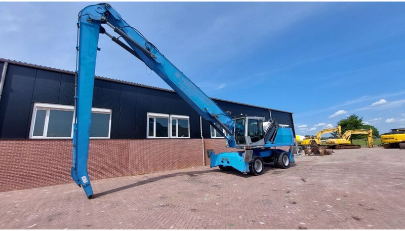 Fuchs MHL360 - Manipulador de materiales: foto 1 Fuchs MHL360 - Manipulador de materiales: foto 1