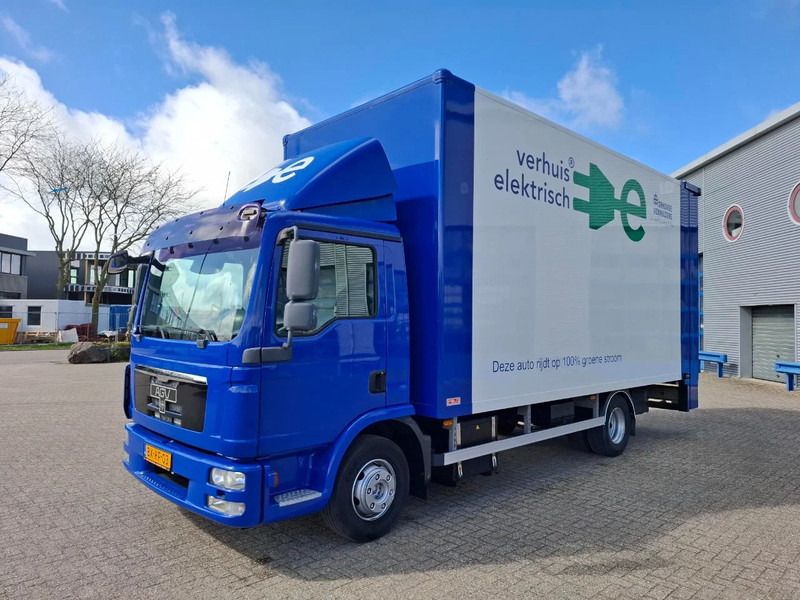 MAN E-TGL 8.180 / 100% ELECTRIC / ONLY:1852 KM / 150KW / 75 KM RANGE / NL MOVING TRUCK / LOADING PLATFORM / STAMPS / AUTOMATIC / 201 - Camión caja cerrada, Camión eléctrico: foto 2 MAN E-TGL 8.180 / 100% ELECTRIC / ONLY:1852 KM / 150KW / 75 KM RANGE / NL MOVING TRUCK / LOADING PLATFORM / STAMPS / AUTOMATIC / 201 - Camión caja cerrada, Camión eléctrico: foto 2