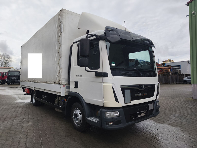 MAN TGL 8.190 Pritsche / Plane 3-Sitzer Euro 6 4x2 LBW AHK (57) - Camión lona: foto 2 MAN TGL 8.190 Pritsche / Plane 3-Sitzer Euro 6 4x2 LBW AHK (57) - Camión lona: foto 2