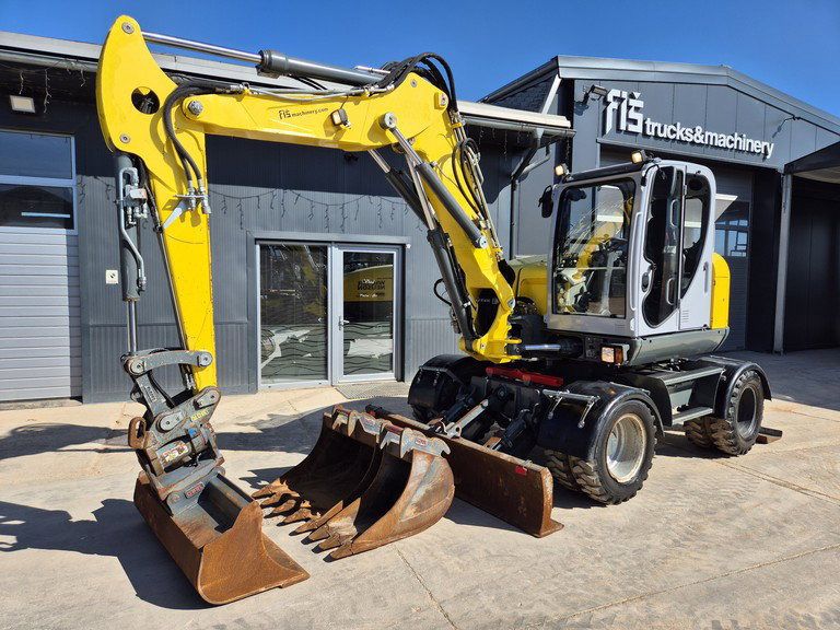 WACKER NEUSON EW100 - Powertilt - 3X Buckets - Stabilizers - 2021 Year - Excavadora de ruedas: foto 1 WACKER NEUSON EW100 - Powertilt - 3X Buckets - Stabilizers - 2021 Year - Excavadora de ruedas: foto 1
