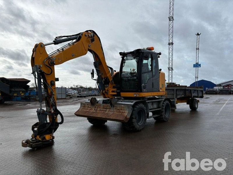 Liebherr A910 Hjulgrävare med redskap och kärra (126726) - Excavadora de ruedas: foto 1 Liebherr A910 Hjulgrävare med redskap och kärra (126726) - Excavadora de ruedas: foto 1
