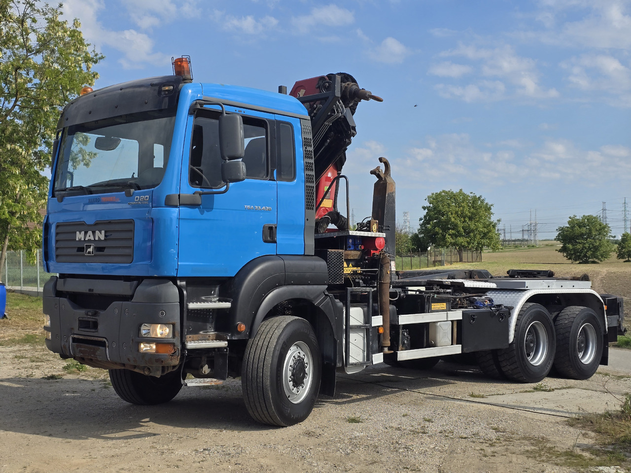 MAN TGA 33.430 6X6 / HMF 1823 K3+REM.CON./ HOOK SYSTEM 2x in stock - Multibasculante camión, Camión grúa: foto 3 MAN TGA 33.430 6X6 / HMF 1823 K3+REM.CON./ HOOK SYSTEM 2x in stock - Multibasculante camión, Camión grúa: foto 3