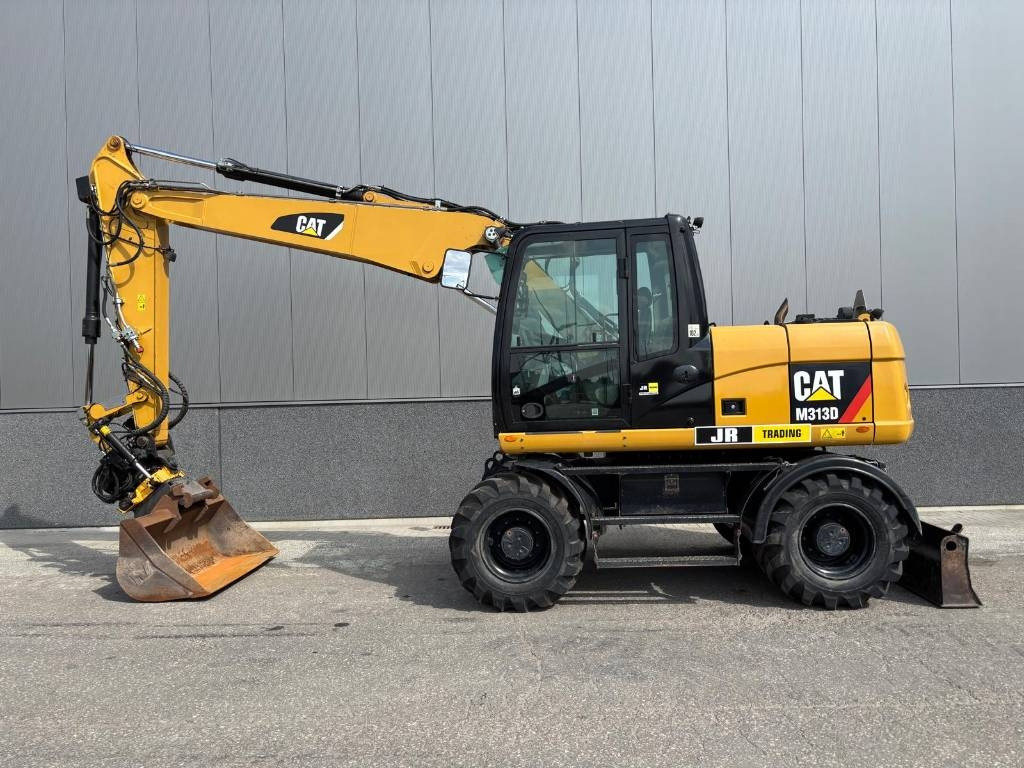 CAT M 313 D - Excavadora de ruedas: foto 1 CAT M 313 D - Excavadora de ruedas: foto 1
