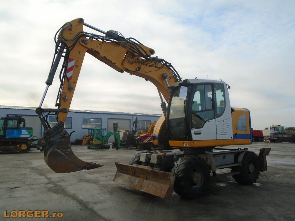 Liebherr A 914 Compact - Excavadora de ruedas: foto 1 Liebherr A 914 Compact - Excavadora de ruedas: foto 1