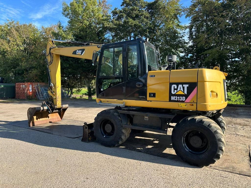 Cat M 313 D - 13.285H - Excavadora de ruedas: foto 1 Cat M 313 D - 13.285H - Excavadora de ruedas: foto 1