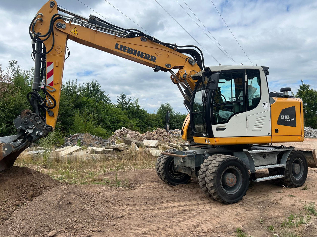Liebherr A 918 Compact Likufix SW 48 - Excavadora de ruedas: foto 1 Liebherr A 918 Compact Likufix SW 48 - Excavadora de ruedas: foto 1
