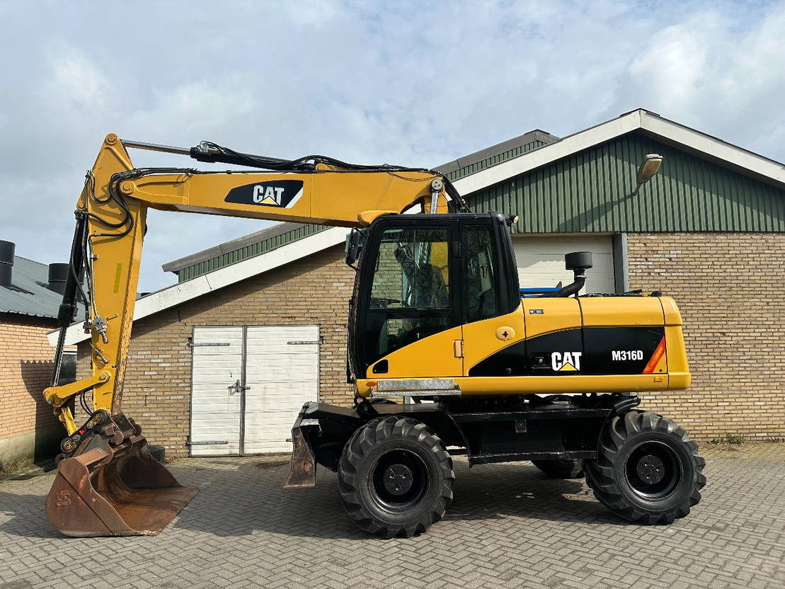 Caterpillar M316D - Excavadora de ruedas: foto 1 Caterpillar M316D - Excavadora de ruedas: foto 1