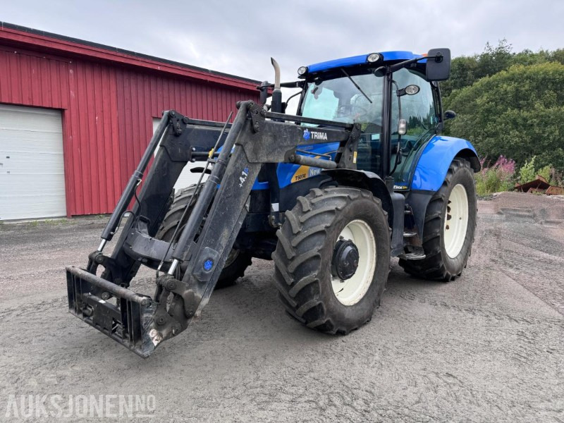 2012 New Holland T6050 med Trima +4.1P frontlaster og panser beskytter - 40 km/t - Tractor: foto 1 2012 New Holland T6050 med Trima +4.1P frontlaster og panser beskytter - 40 km/t - Tractor: foto 1