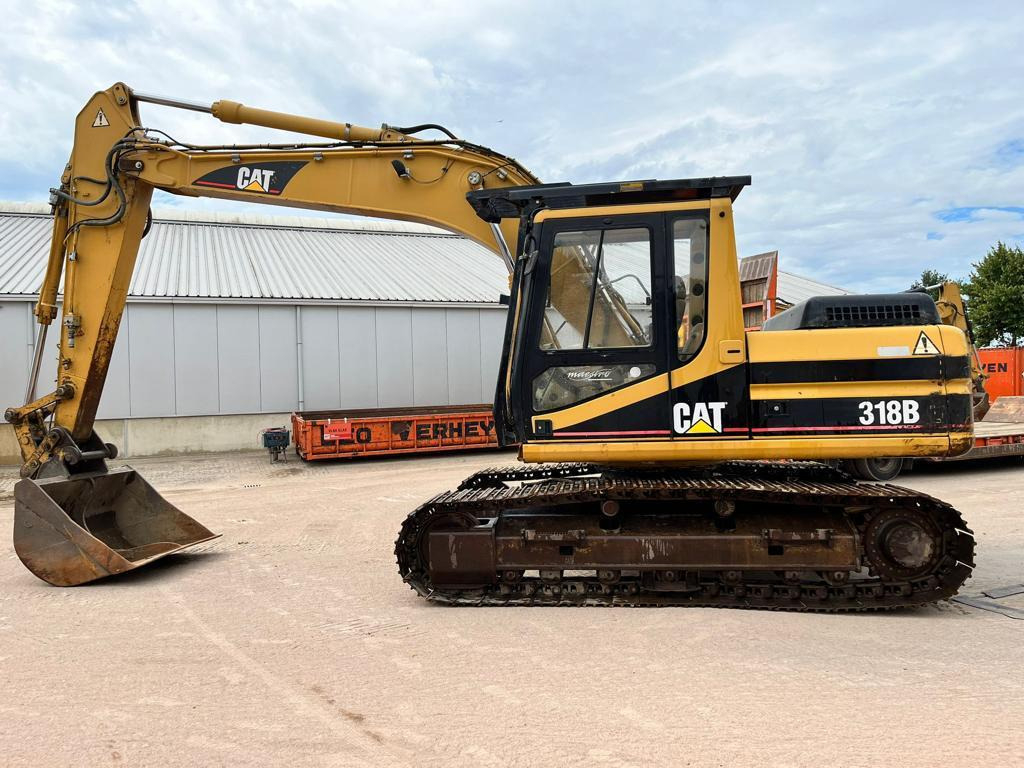 Caterpillar 318BL - Excavadora de cadenas: foto 1 Caterpillar 318BL - Excavadora de cadenas: foto 1
