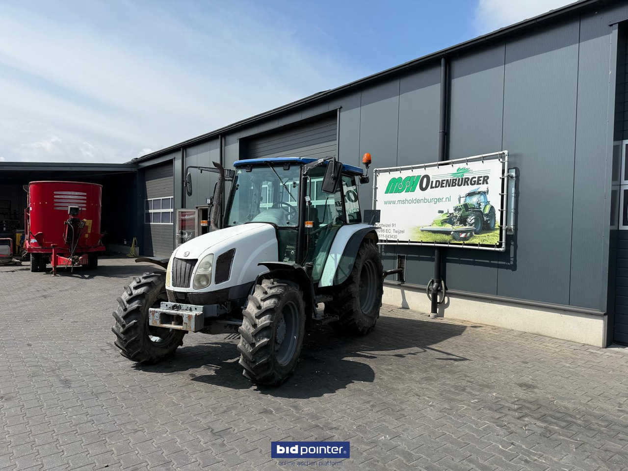 New Holland TL 70A - Tractor: foto 1 New Holland TL 70A - Tractor: foto 1