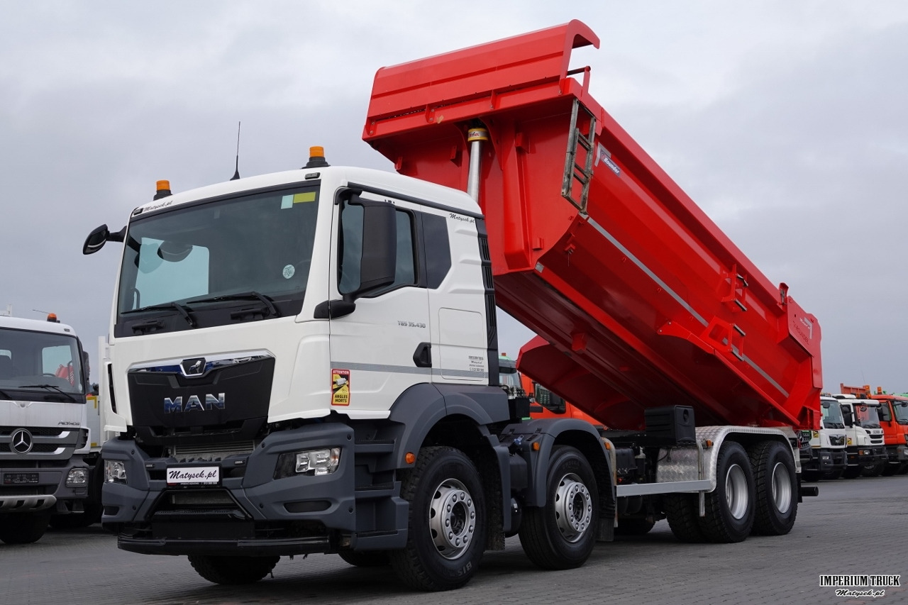MAN TGS 35.430 / 8X4 / WYWROTKA TYLNOZSYPOWA / HYDROKLAPA / OPONY 100% / 2022 ROK / 109 TYS. KM - Volquete camión: foto 1 MAN TGS 35.430 / 8X4 / WYWROTKA TYLNOZSYPOWA / HYDROKLAPA / OPONY 100% / 2022 ROK / 109 TYS. KM - Volquete camión: foto 1