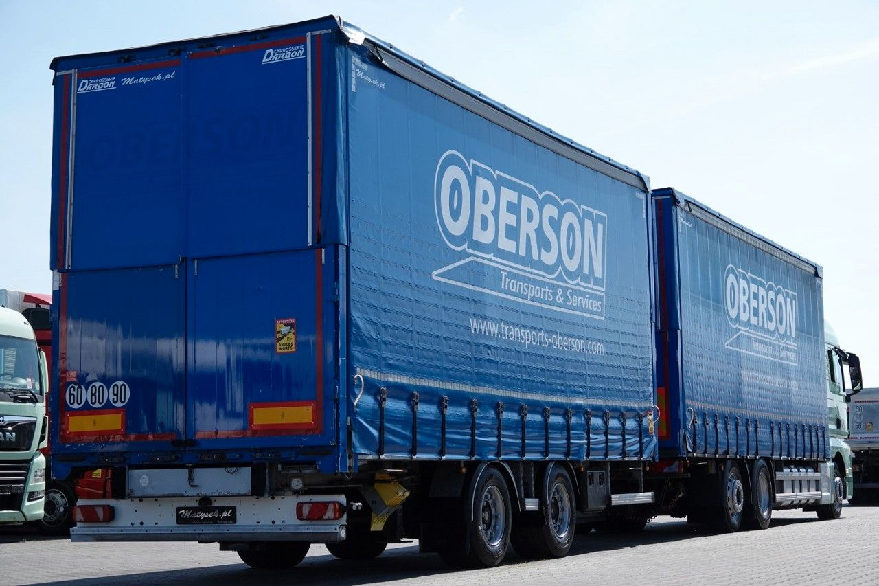 MAN TGX 26.460 / ZESTAW TANDEM PRZEJAZDOWY / 120 M3 - Camión lona: foto 4 MAN TGX 26.460 / ZESTAW TANDEM PRZEJAZDOWY / 120 M3 - Camión lona: foto 4