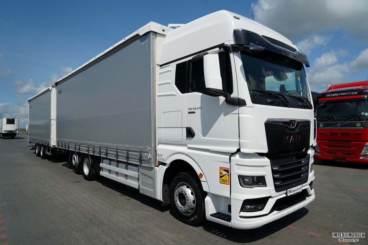 MAN TGX 26.470 / ZESTAW TANDEM 120 M3 / PRZEJAZDOWY / KLIMATYZACJA POSTOJOWA / OŚ PODNOSZONA / PO KONTRAKCIE SERWISOWYM / 2022 / - Camión lona: foto 2 MAN TGX 26.470 / ZESTAW TANDEM 120 M3 / PRZEJAZDOWY / KLIMATYZACJA POSTOJOWA / OŚ PODNOSZONA / PO KONTRAKCIE SERWISOWYM / 2022 / - Camión lona: foto 2