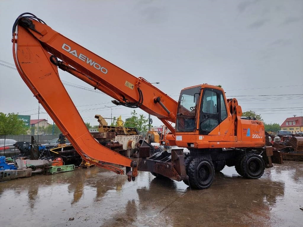 Daewoo Doosan S200W-V - Excavadora: foto 1 Daewoo Doosan S200W-V - Excavadora: foto 1