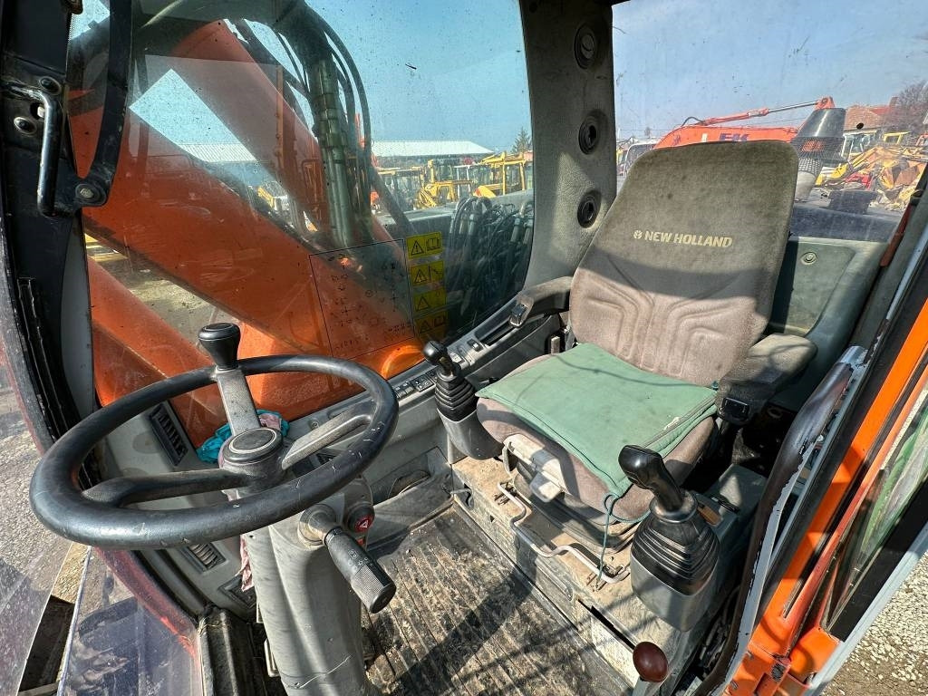Excavadora de ruedas New Holland MH Plus: foto 7