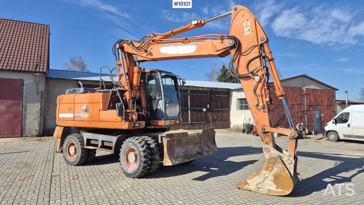 Excavator DOOSAN DX190W (2010) - Excavadora de ruedas: foto 1 Excavator DOOSAN DX190W (2010) - Excavadora de ruedas: foto 1