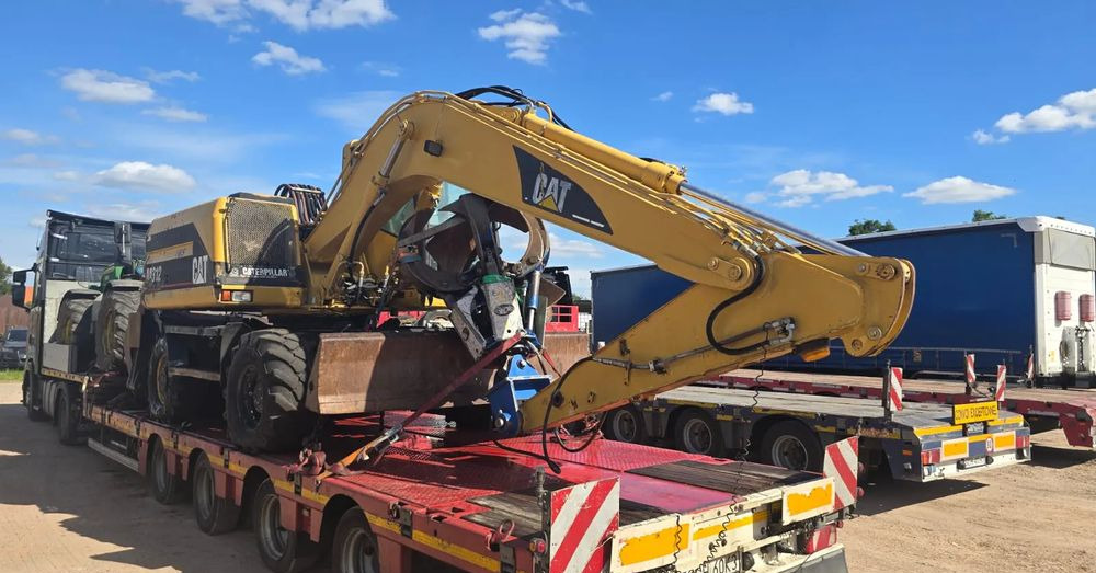 Caterpillar M312 - Excavadora de ruedas: foto 1 Caterpillar M312 - Excavadora de ruedas: foto 1