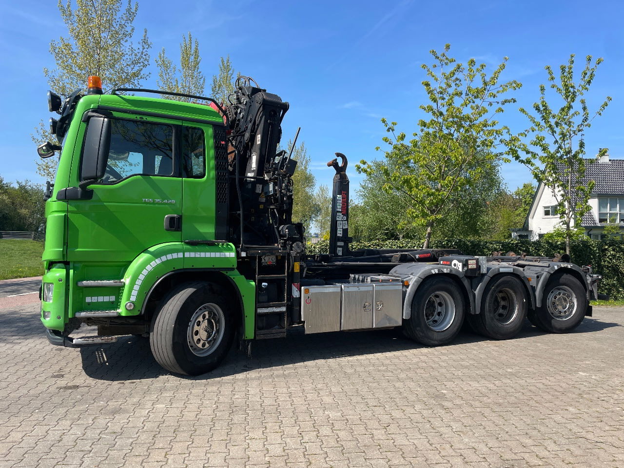 MAN TGS 35.420 met hiab 19tm Z kraan en 26t haakarm, bouwjaar 2018 - Portacontenedore/ Intercambiable camión, Camión grúa: foto 1 MAN TGS 35.420 met hiab 19tm Z kraan en 26t haakarm, bouwjaar 2018 - Portacontenedore/ Intercambiable camión, Camión grúa: foto 1