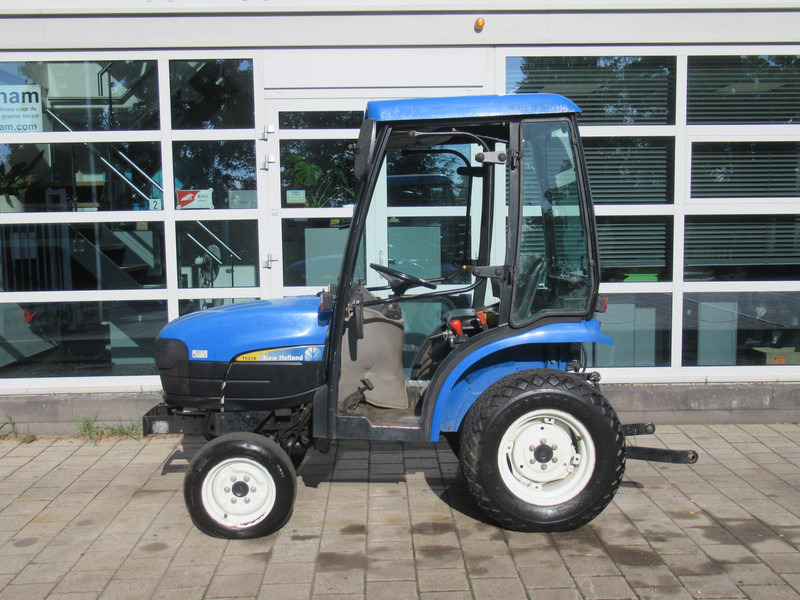 New Holland TC21D 4WD 4x4 Cabine Verwarming - Tractor: foto 2 New Holland TC21D 4WD 4x4 Cabine Verwarming - Tractor: foto 2