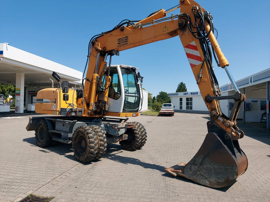 Liebherr A 316 LITRONIC TL + 2005 DEUTZ 13400 STD. - Excavadora de ruedas: foto 3 Liebherr A 316 LITRONIC TL + 2005 DEUTZ 13400 STD. - Excavadora de ruedas: foto 3