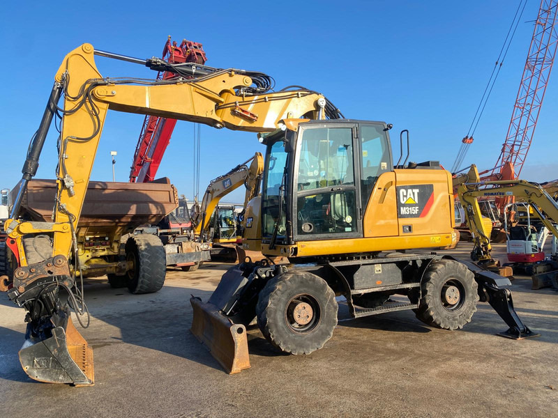 Caterpillar M315 F - Excavadora de ruedas: foto 1 Caterpillar M315 F - Excavadora de ruedas: foto 1