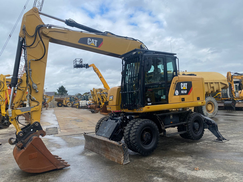 Caterpillar M316F NVT - Excavadora de ruedas: foto 1 Caterpillar M316F NVT - Excavadora de ruedas: foto 1