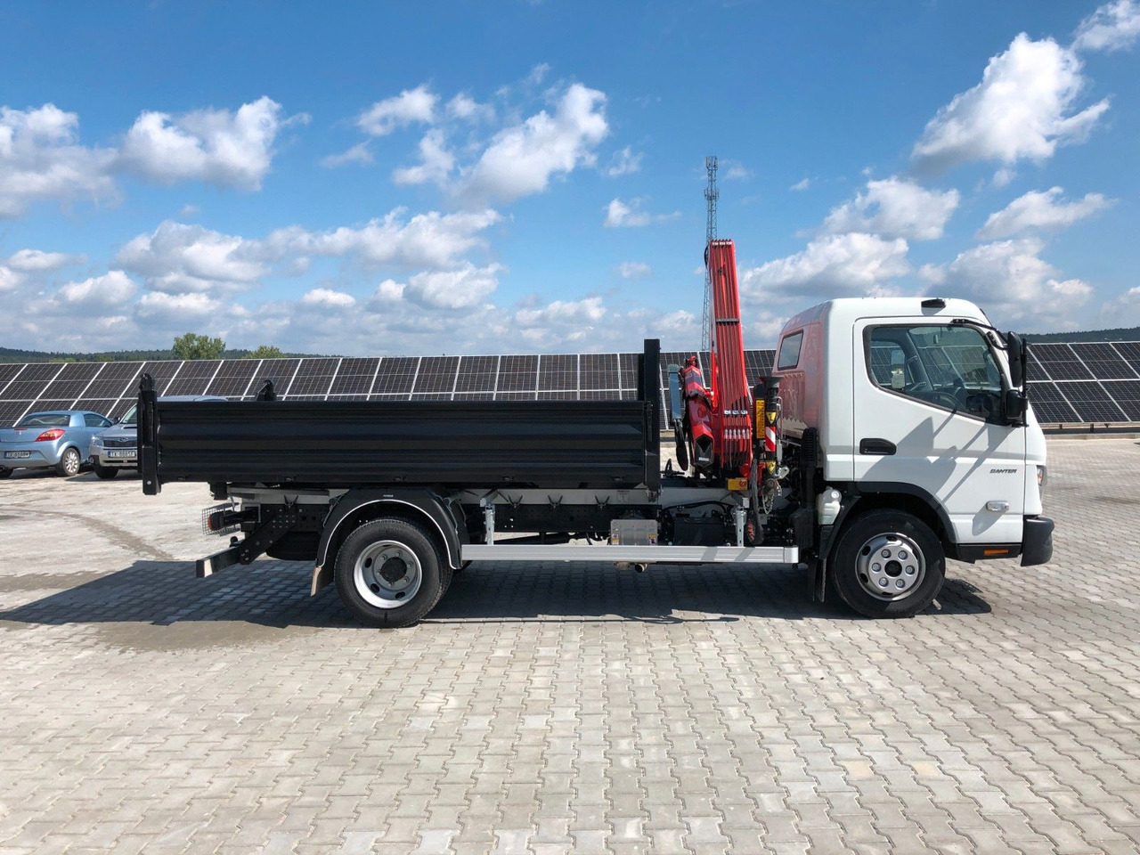 FUSO CANTER 9C18 mit FASSI F65B - Volquete camión, Camión grúa: foto 4 FUSO CANTER 9C18 mit FASSI F65B - Volquete camión, Camión grúa: foto 4