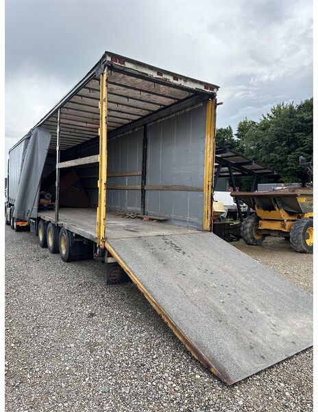 Schmitz Cargobull Machine transport trailer with big ramp - Semirremolque: foto 1 Schmitz Cargobull Machine transport trailer with big ramp - Semirremolque: foto 1