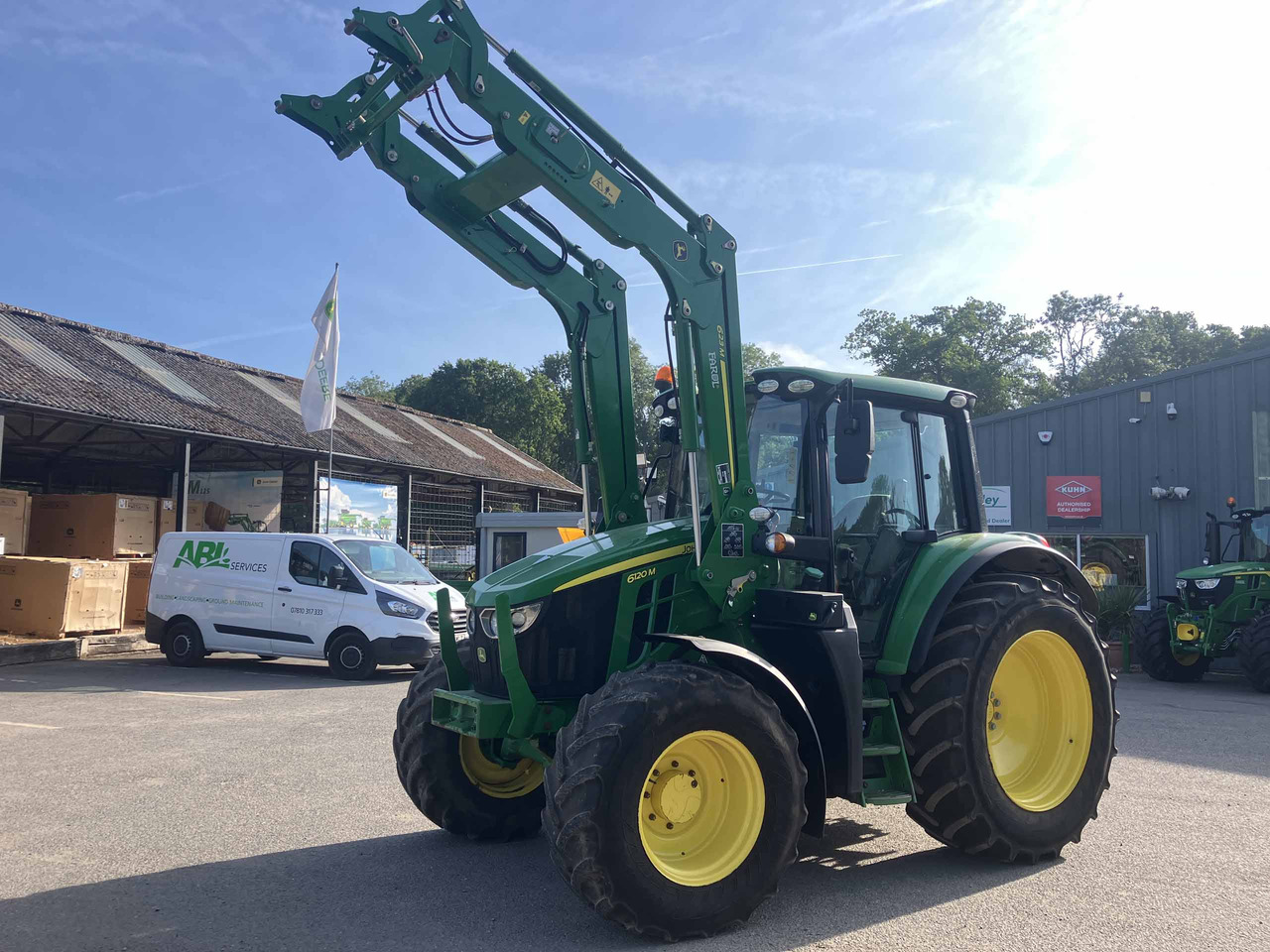 John Deere 6120M - Tractor: foto 1 John Deere 6120M - Tractor: foto 1